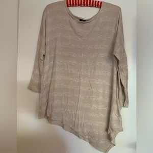 Gently used asymmetrical top